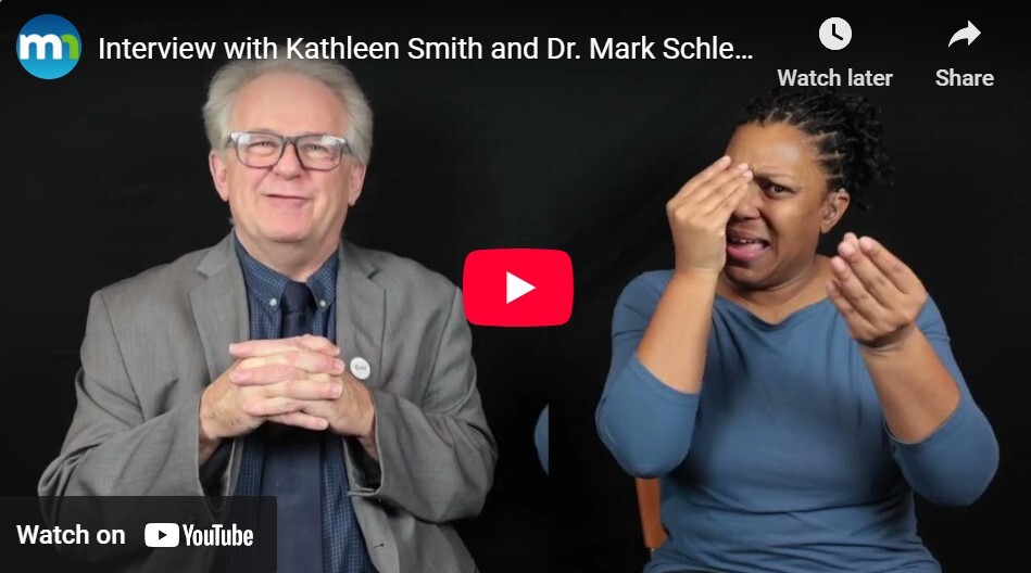 Dr. Mark Schliess and interpreter Regina Daniels