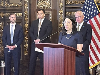 Commissioner Gandhi with Gov. Walz, James Clark and John Connolly at the anti-fraud package announcement