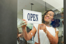Business owner opening their store