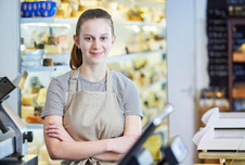 Teenage girl working at a bakery
