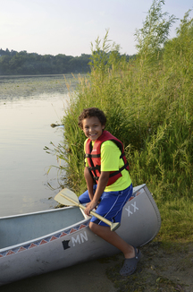 boy with canoe