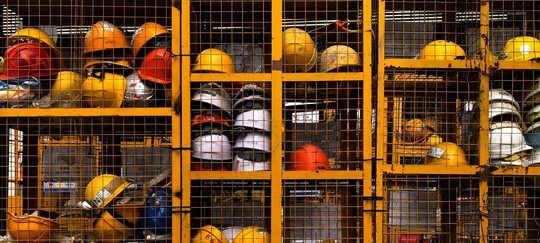 A photo of hard hats in lockers