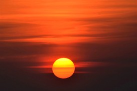 A photo of a red sun
