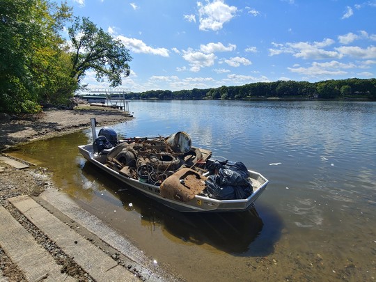 Boat load of trash and metal items collected from the Mississippi River during the drawdown.