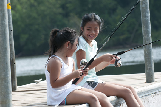 Two girls fishing