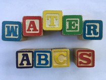Blocks spelling Water ABCs