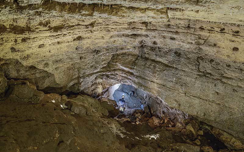 Caver in cave