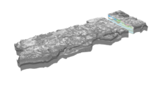 three-dimensional view of a county with a slice through the upper end showing the ground beneath