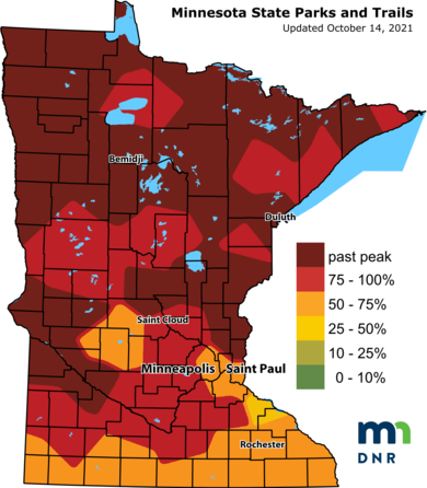 Map of the state of Minnesota in different shades of dark red, orange and yellow to denote fall color changes in different regions.