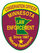 The division of Enforcement logo