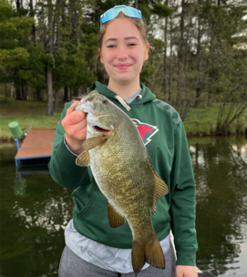 angler holding a bass