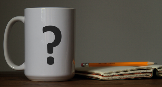 A mug with a question mark on it