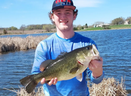 angler holding a large bass