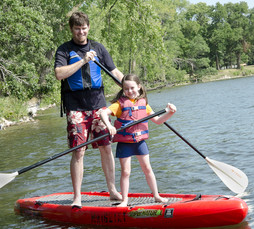 Two people paddleboarding