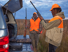 father and son at the truck before a pheasant hunt