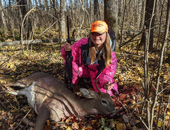 hunter with the deer she harvested