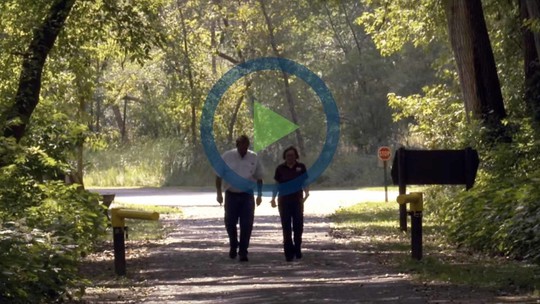 A screenshot of the YouTube video with the play icon on it