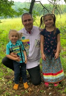 Bradley E. Harrington and two children