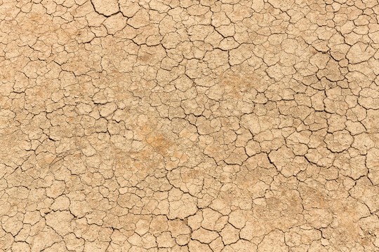 A stock photo of dry soil