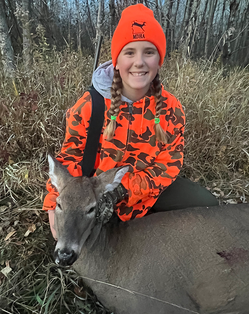 youth hunter with her harvested deer in MDHA hat