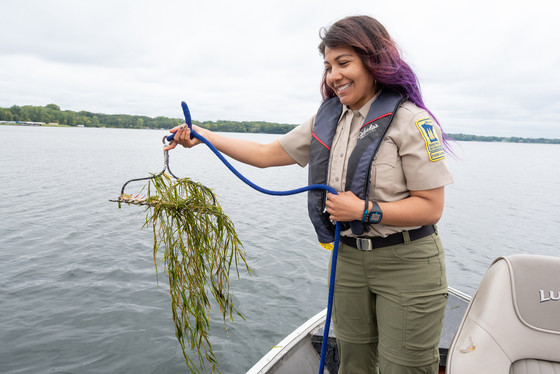 A photo of an intern conducting a rake survey