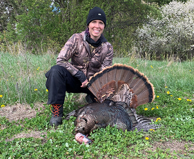 turkey hunter and the bird she harvested