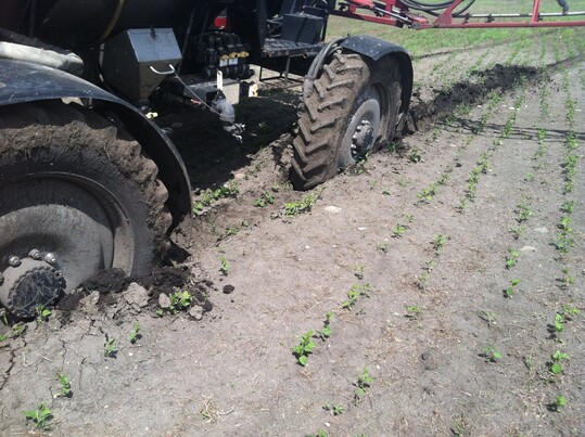 tractor stuck in mud in field