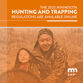 DNR hunting regulations cover with turkey hunters on front, DNR logo, and regulations available online