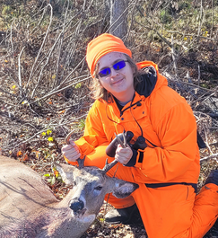 youth with a deer he harvested