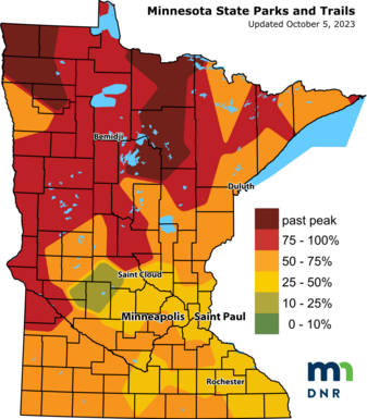 Map of the state of Minnesota with sections in red, orange, yellow and shades of green denoting fall color change in different regions.