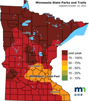 Map of the state of Minnesota with sections in red and orange shades denoting fall color change in different regions.