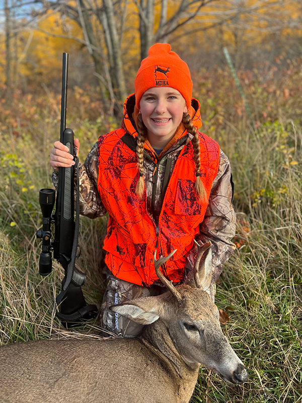 girl with deer she harvested