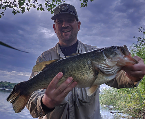 angler holding a large bass