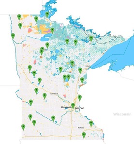 A map of Minnesota shows green markers dotting where swimming beaches are. 