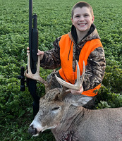 youth hunter with deer he harvested