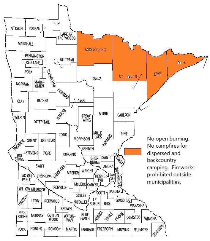 Map of Minnesota counties with elevated burning restrictions: Cook, Koochiching, Lake, and the northern half of St. Louis.