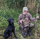 young hunter, dog and teal harvested