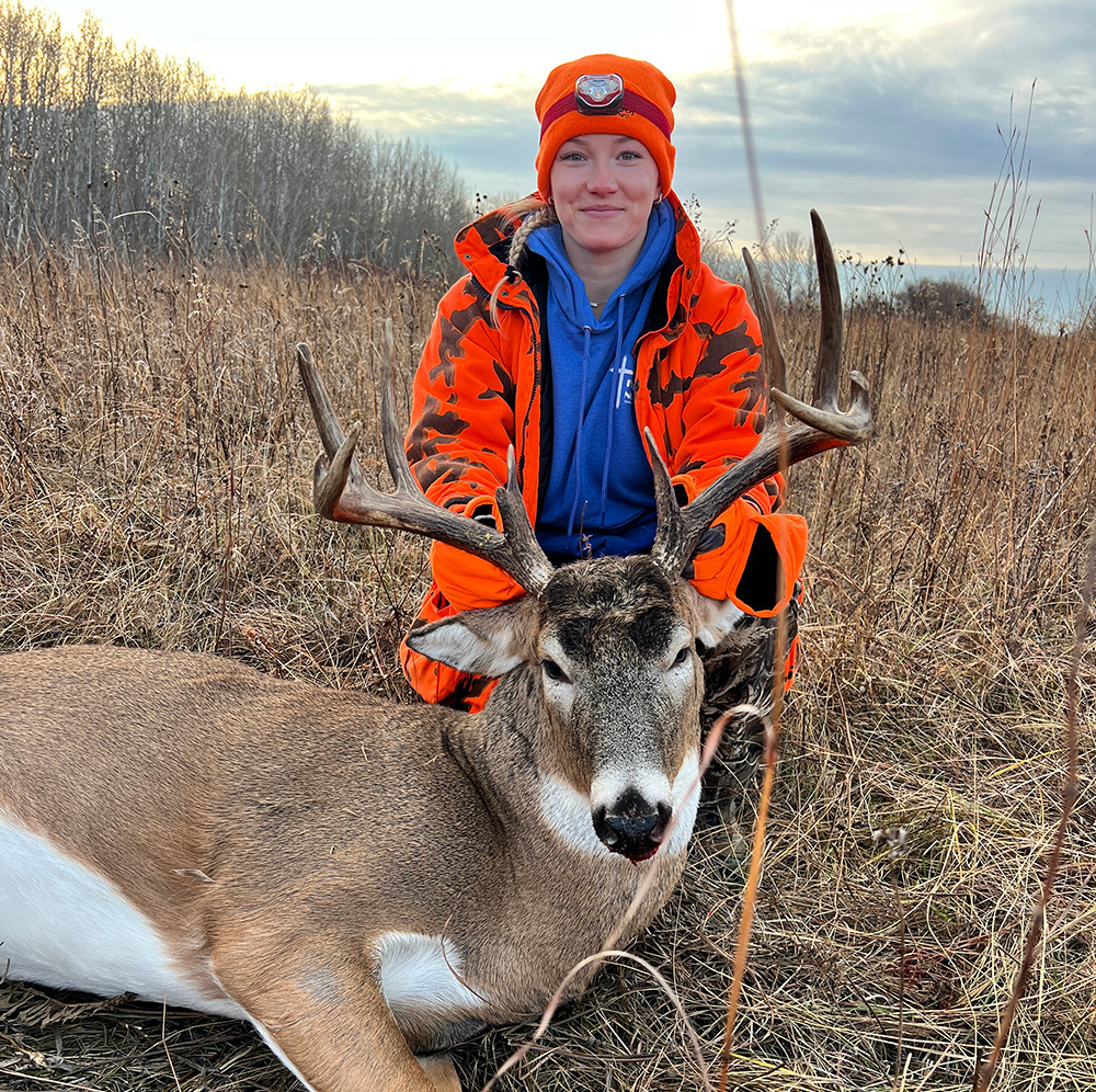 hunter with nice buck she harvested