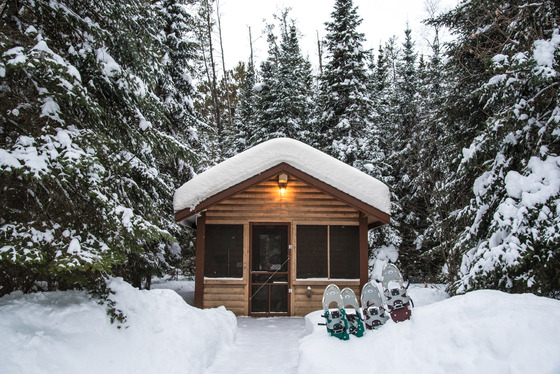 A camper cabin in the snow