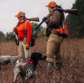 pheasant hunters with a dog