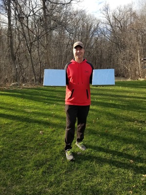 Man holding hail pads