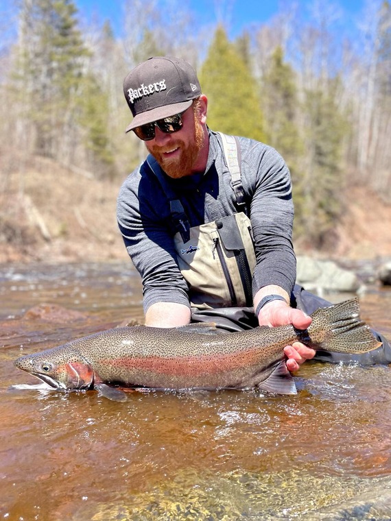 Angler with Steelhead