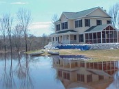House elevated above floodwaters