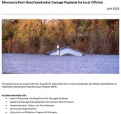 House under water to just below the roof line