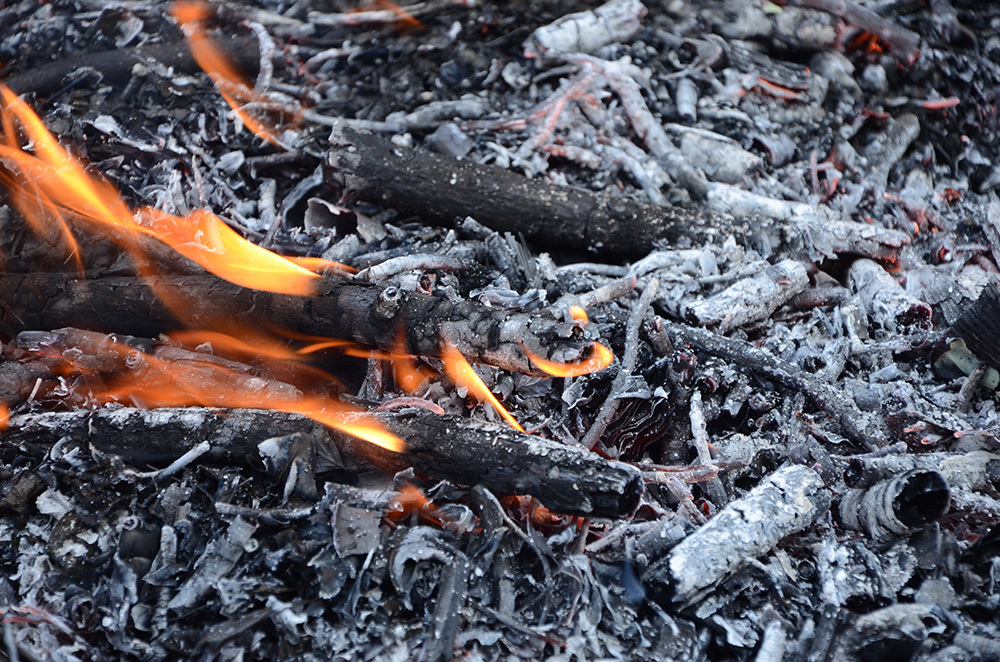embers and ashes with some fire