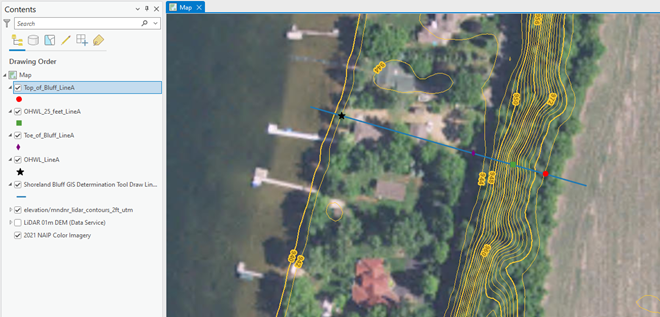 aerial photo with flat area near waterbody and steep area with many two foot contour lines set back 