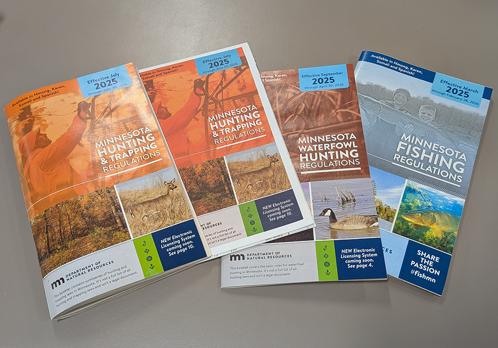 Photos of the hunting regulations, deer map insert, waterfowl regulations and fishing regulations with outdoor photos, DNR logos and 2025