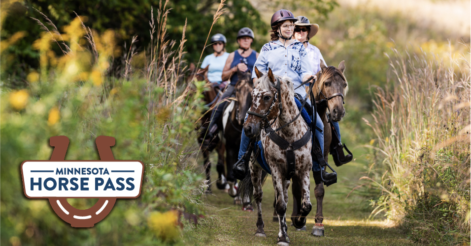 Horse Pass logo. Horse riders walk through a prairie. 
