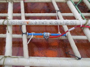 Researchers attached strain and temperature gauges to the GFRP reinforcement bars before concrete was poured on the bridge deck.
