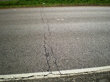 Crack in pavement.